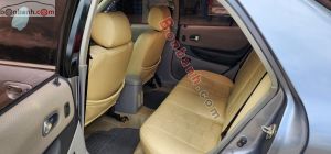 Xe Ford Laser GHIA 1.8 MT 2002