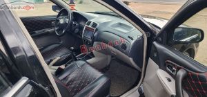 Xe Ford Laser GHIA 1.8 MT 2003